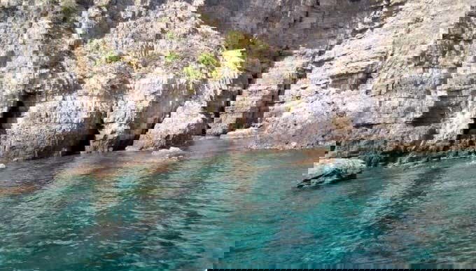 Touring the caves along the Bay of Infreschi