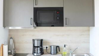 Stadtloft Apartment "Alexandersfeld" Moderne Extended Stay Apartments nahe Zentrum - Photo 5, stove