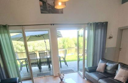 Ferienhaus Deluxe, direkt am See, mit hauseigener Panorama Außensauna, zwei Badezimmern, Tretboot, Kamin, in direkter nähe zum Kinderspieleparadies sowie Reit- und Ponyhof, 1 bis 8 Personen - Photo 20