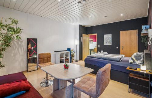 BAT Home Solutions Trier-Euren - alles was ein Hotel nicht bietet - 35 qm Ferienwohnung, Heimkino, Wallbox, Küche für 4 Personen - Foto 22