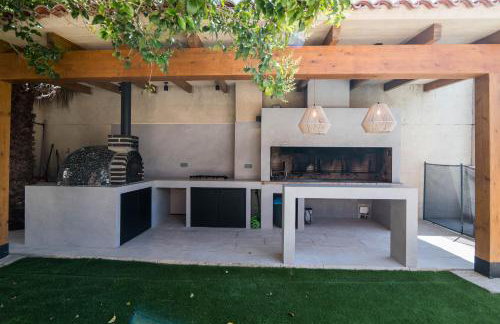 Villa con barbacoa para familias - Foto 13