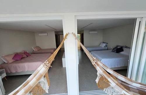 Piscina aquecida, 5 suítes e pé na areia com vista espetacular!! - Photo 64