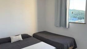 Apê centro de Capitólio- Condomínio Monitorado - 4º Andar - Vaga de Garagem - Foto 5