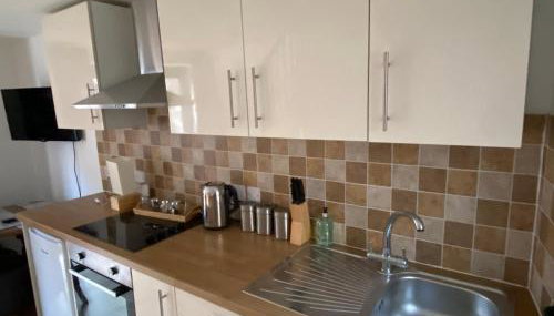 Clock Tower Cottage - Photo 2, stove, toaster