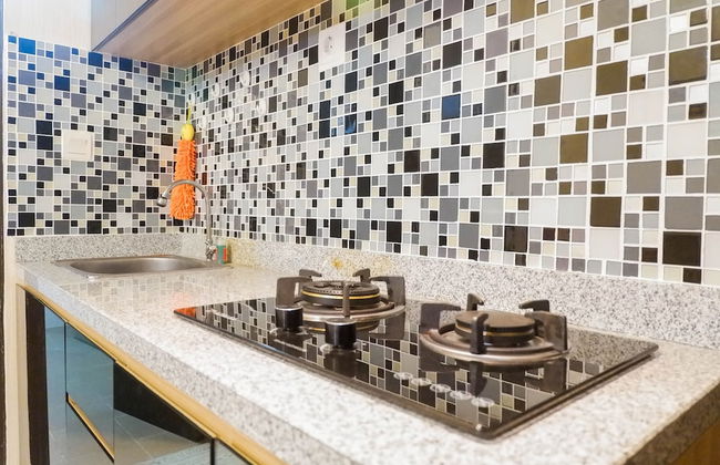 Homey 2BR Apartment at Tamansari Papilio - Photo 8