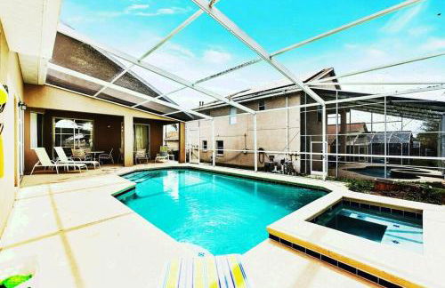 Spacious Disney Themed 5Bed Villa! Private Heated Enclosed Pool/Spa/BBQ! - Photo 1