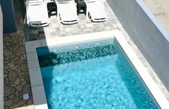 Sun n' Fun Apartments with Pool - Photo 6