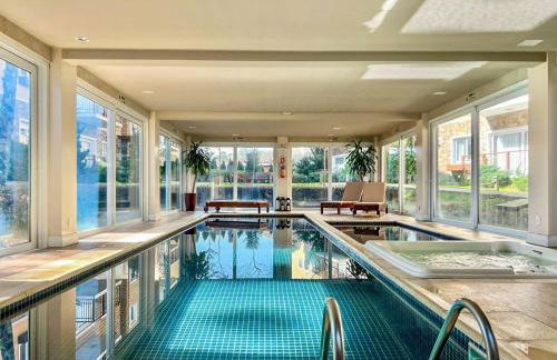 Casa de Pedra 2 Suítes c/ Piscina by Achei Gramado - Photo 3