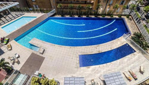 Unlimited Ocean Front - Frente à Praia Vista Mar Hidromassagem 2 Piscinas Climatizadas 2 Saunas Seca e Úmida Wi-Fi 350MB - Foto 2