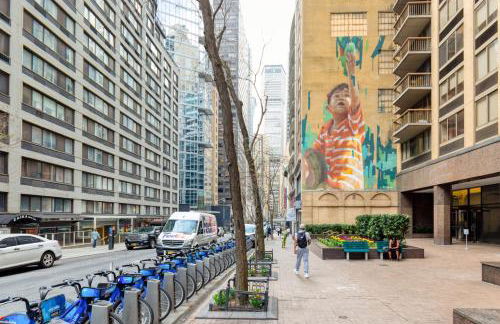 Midtown East 1BR w DM nr UN NYC-906 - Foto 19