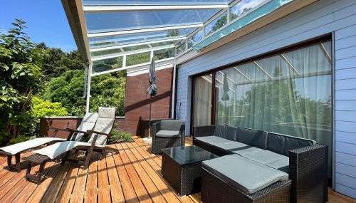 Ferienhaus Wellnesshütte mit Außenwhirlpool und herrlichem See-und Alpenblick - Foto 3