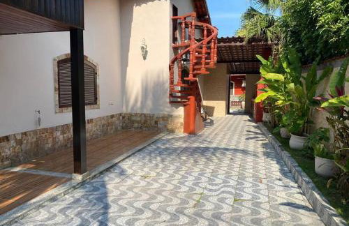 Ampla casa em condomínio a 300mt da praia - Foto 29