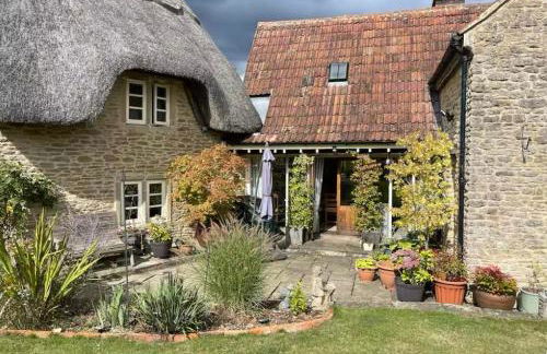 Thatch Cottage B&B - Foto 1