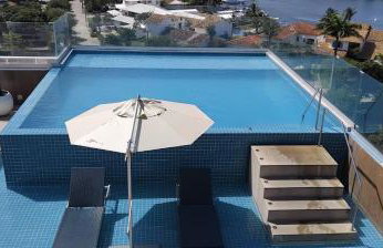 Flat Aconchegante Edifício Royale Cabo Frio - Passagem - Praia do Forte - Foto 8