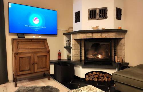 Ferienhaus Blaue Blume mit 11 kW Ladestation, Kamin, Terrasse, eingezäuntem Garten, Sauna, WLAN, Netflix, 2 Hunde willkommen! - Foto 3