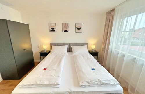 Basilisk Homes - in Grenzach-Wyhlen bei Basel - 4 x Moderne Fewos je 1bis2, 1bis4 oder 1bis6 Pers mit Küche und Balkon oder Terrasse - Parkplätze vorhanden - Foto 12