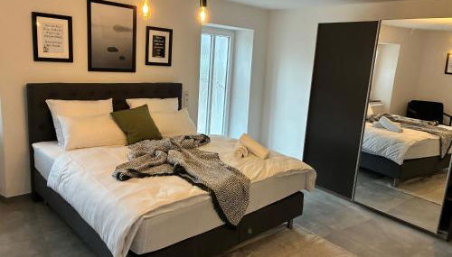 FeWo - EG Apartment Mosel- & Weinquartier, Terrasse, Parkplatz, moderne Küche bis 4 Personen - Foto 2