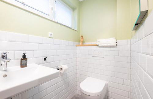 The Woodmans Airport Boardinghouse - Foto 15