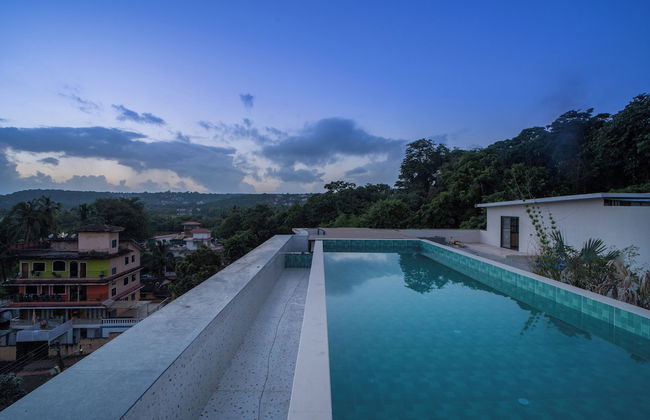 ELIVAAS Kamerios Verano 1 BHK with Pool - Photo 49