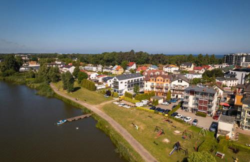 SOLEK, Apartamenty hotelowe i pokoje gościnne ze śniadaniem, przyjazne zwierzętom, wyjątkowe, z widokiem na Jezioro Jamno i w bardzo bliskiej odległości od morza - Foto 74