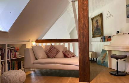 Dachgeschosswohnung Warft Simmerdeis in Reetdachhaus mit parkähnlichem Garten - Foto 14