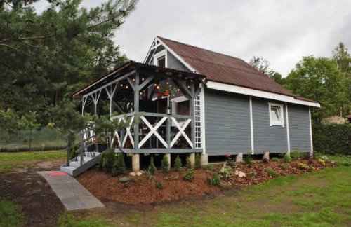 Drewniany domek nad jeziorem w Sitnie - Foto 1