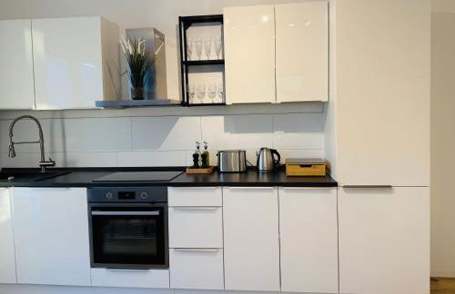 Charmantes Apartment mit Balkon - Küche - SmartTV - Foto 7