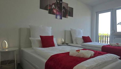 HAPPY HOMES FUN - Dein Erlebnis-Apartment für Gamer, Helden & große Kinder - Parkplatz - PS5 - WLAN - Foto 4, furniture, heating