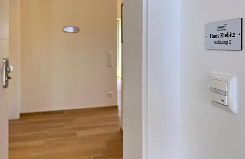 Haus Kiebitz 2 OG - Neubau-Apartment mit Infrarot-Sauna, Balkon & 600 m zum Strand - Foto 8