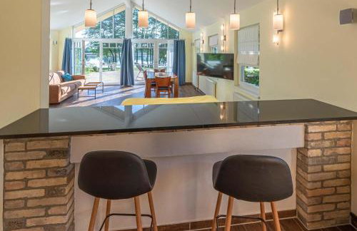 Wildgans - Stilvolles Ferienhaus mit Terrasse, Seeblick & Naturidylle am Loppiner See - Foto 5