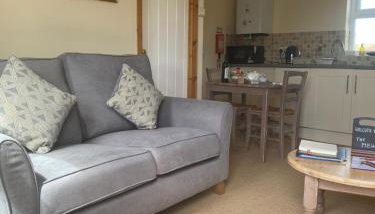 Station House Holiday Cottages, Exclusively For Grown Ups, Thornton Dale - Photo 3, furniture, stove, dishwasher, toaster