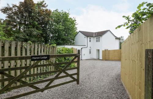 Heron's Lodge - Photo 1