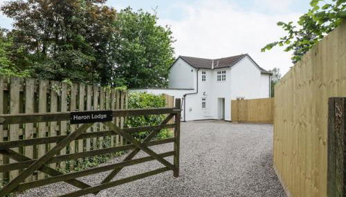 Heron's Lodge - Photo 1