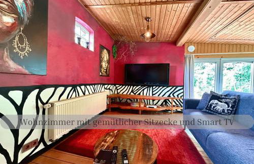 Lodge of Africa - einzigartige Themenzimmer, eingezäunten Garten, Sauna, Whirlpool & Kamin, Hunde willkommen, Gasgrill, voll ausgestattete Küche, großer Essbereich, Hamburg & Stade in der Nähe - Photo 42