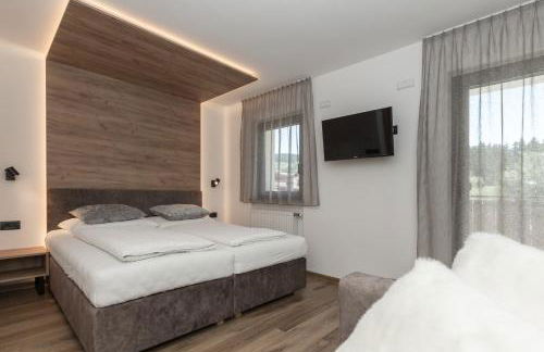 Aparthotel Familiaris - Family Apartments - Pools & Spa in Dolomites - Foto 77