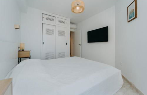 PISO EN LA PLAYA CON PISCINA - Photo 15