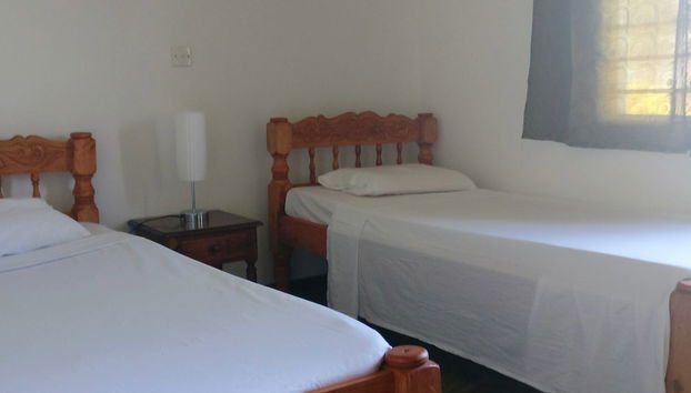 Malaika Beach Villas - Foto 5, Habitación