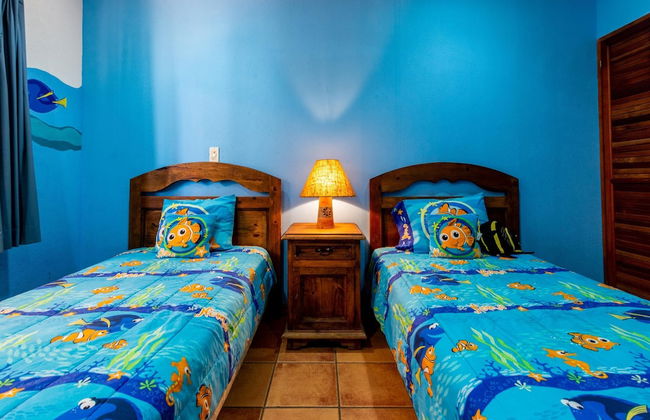 Beachfront Condo with Warm, Rustic Interiors & Direct Access to Playa Flamingo - Photo 3