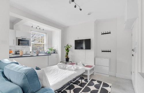 Designer 1-Bed Flat, 1-Min to Tube, Fast Central London Access - Foto 33