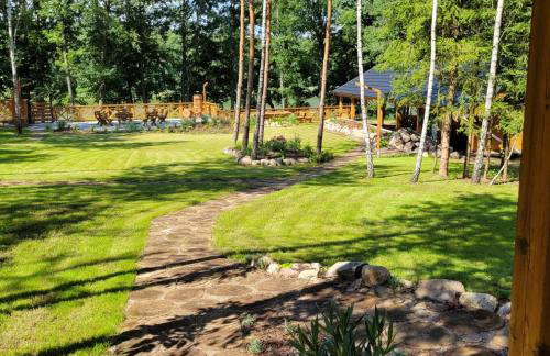 Leśna Kryjówka domki w lesie - Foto 39