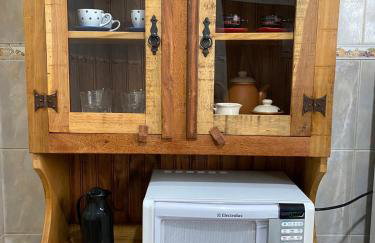 Casa aconchegante à 400m da Praia da Tartaruga - Ar condicionado - WIFI 450MB - Netflix - Cozinha Completa - Garagem - Foto 23