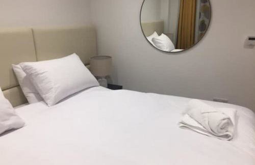 Relax in style at my stunning Holywell Beach home - Foto 26