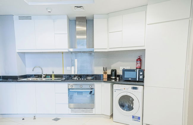 Nasma Holiday Homes - DAMAC Hills Artesia Tower C - Photo 4