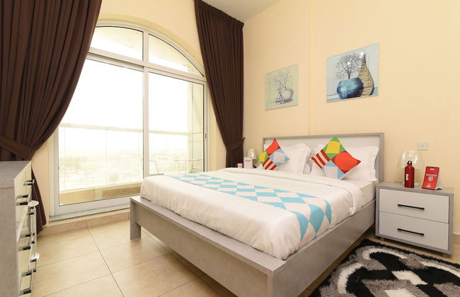 OYO Home 2351BHK Capitol Tower DIC - Photo 1