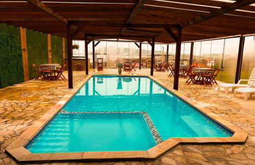 Chalé com Piscina Aquecida - Vista Panorâmica da Praia, a 200m do Mar, Sala de Jogos, Academia e Churrasqueira - Photo 1