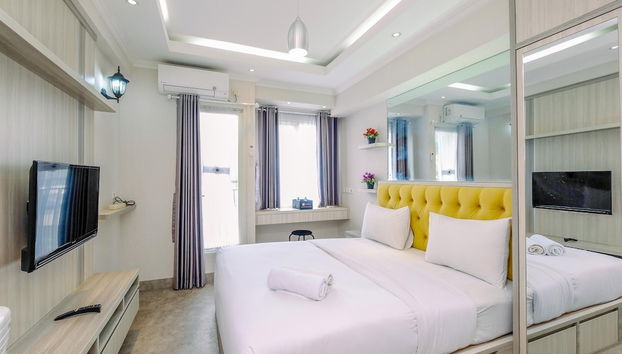 Homey Studio Room at Podomoro Golf View Apartment - Foto 4, Habitación