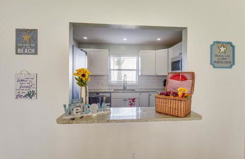 Coastal Condo Escape with Patio Steps to Beach - Photo 9