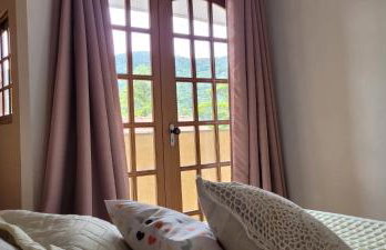 Hospedagem Doce Lar Casa Violeta - Foto 12