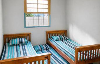 Casa Temporada Ubatuba perto da praia, check-in e out flexíveis com 5 vagas na garagem, wifi, churrasqueira - Foto 9
