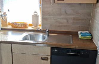 Apartment mit komplett eingerichteter Küchenzeile im Wohnraum by Interhome - Foto 10